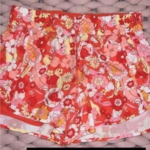 Floral athletic shorts.